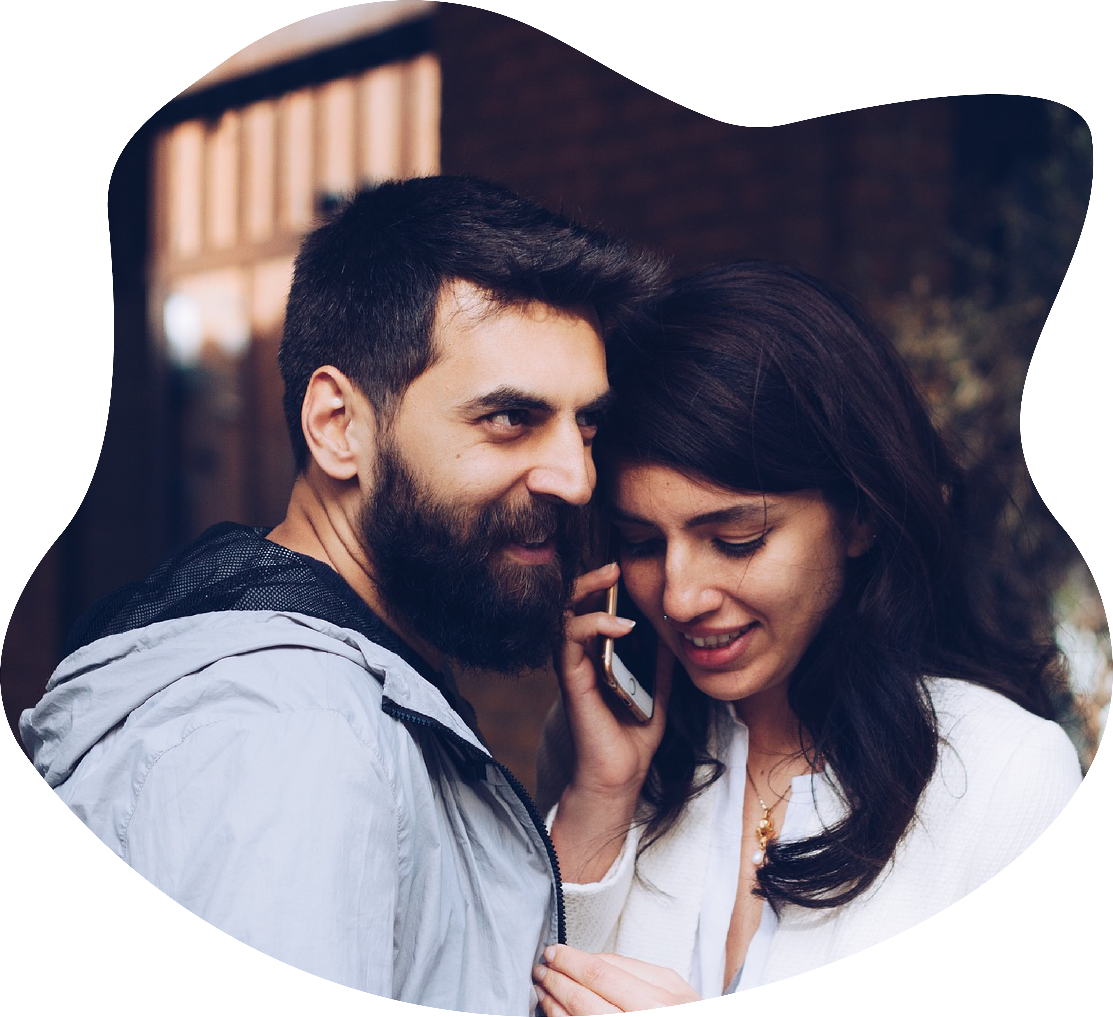 Residential Voice Services Graphic, Image of a couple happily engaged in a phone call